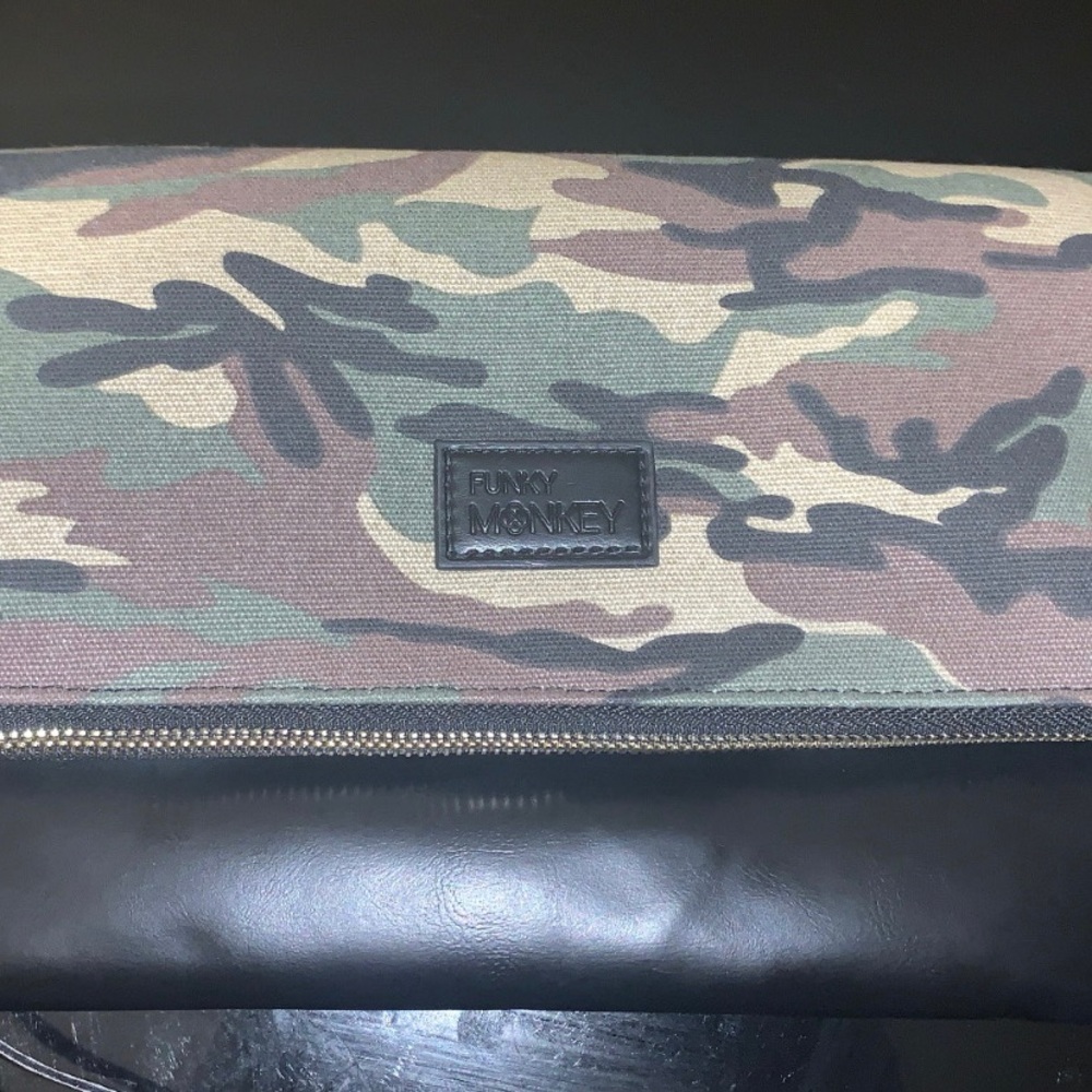 Trendy fold over clutch will pair amazing with pretty much anything.
